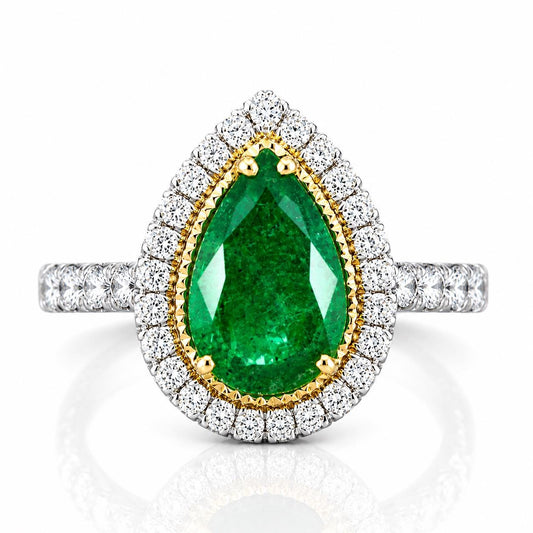 A stunning ring featuring a large, vibrant green gemstone surrounded by a halo of sparkling diamonds.