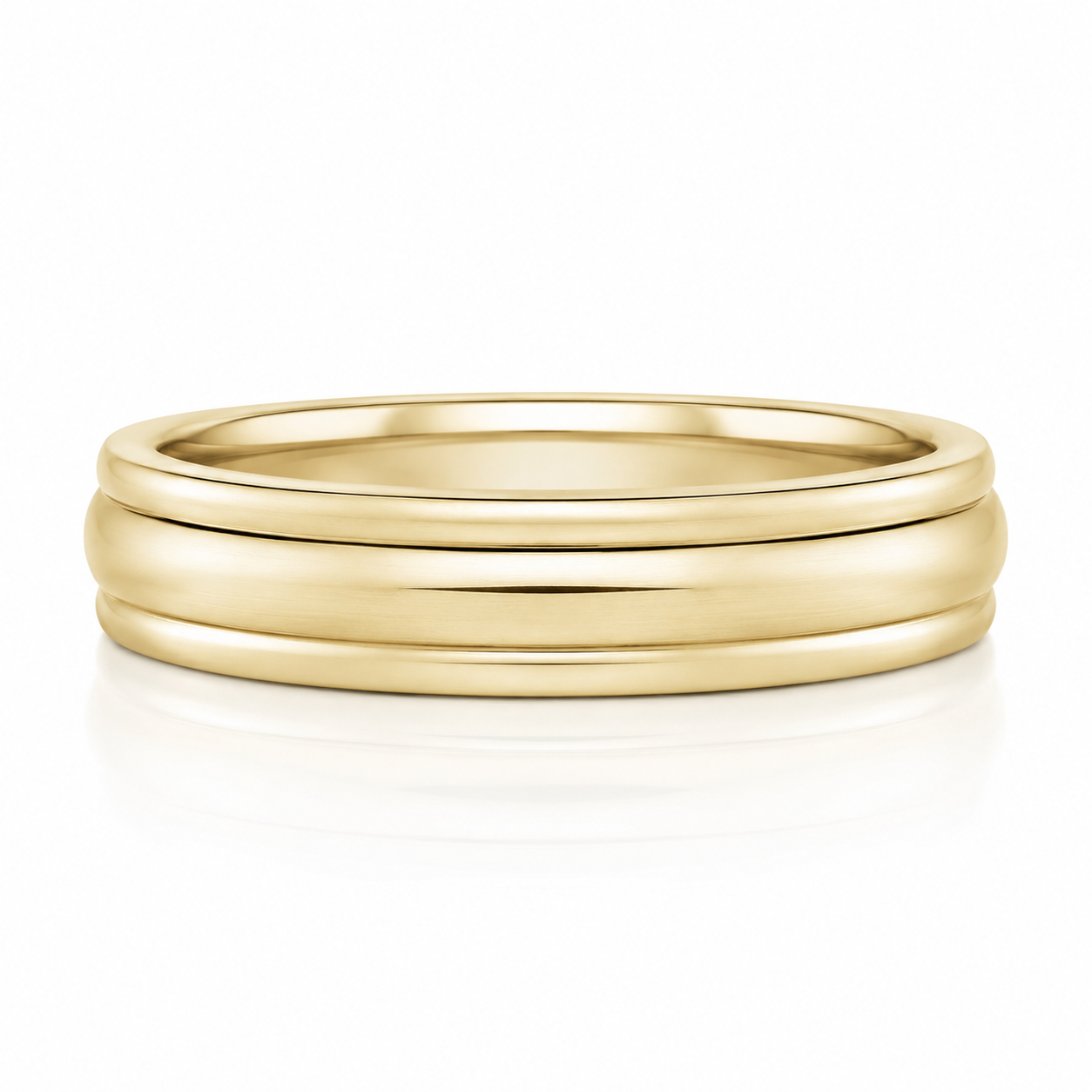 A gold ring with a simple, elegant design.