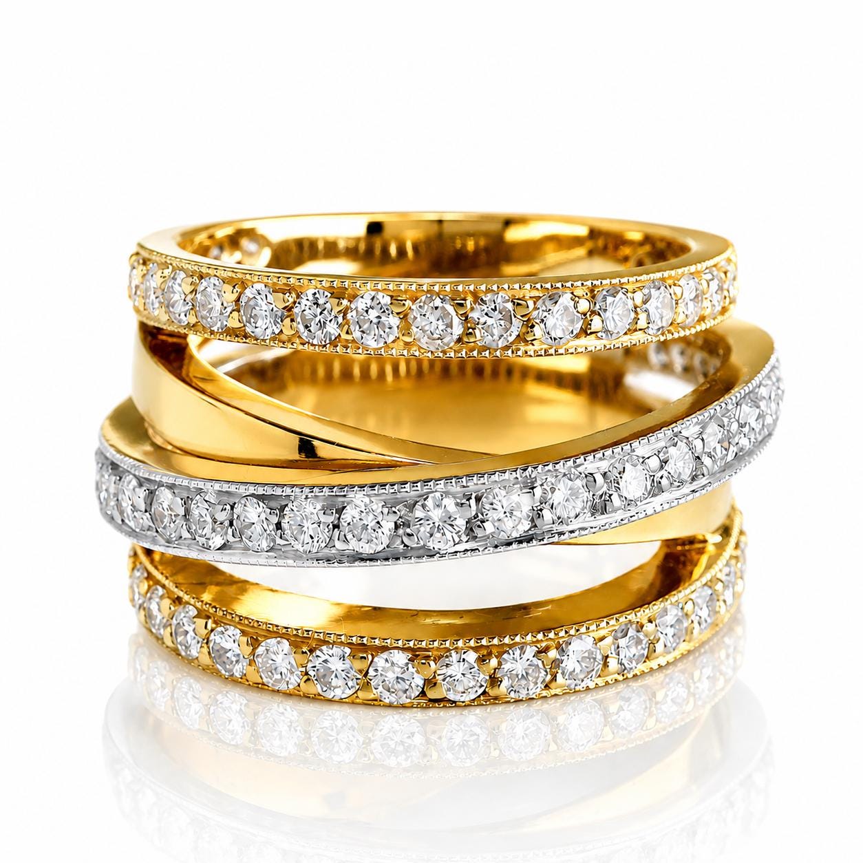 A stack of three gold rings with diamond accents, showcasing the intricate designs and sparkling gemstones.
