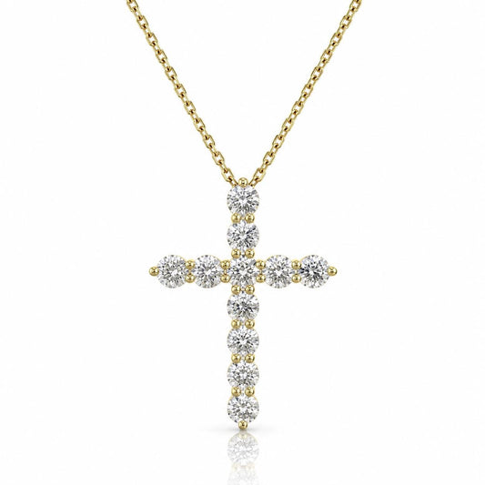 A gold-colored necklace with a large, intricately designed diamond cross pendant.