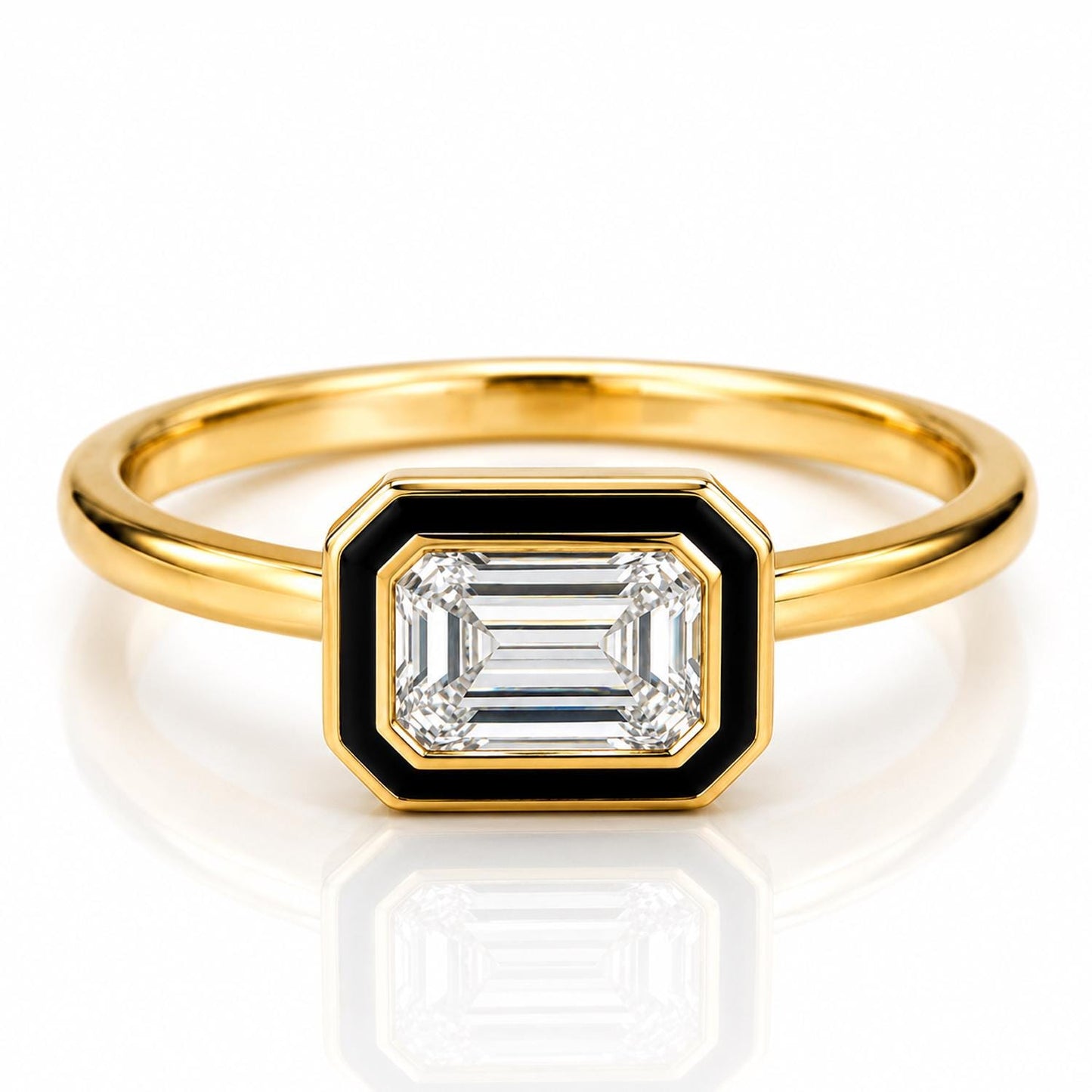 A gold ring with a large, clear gemstone set in the center.