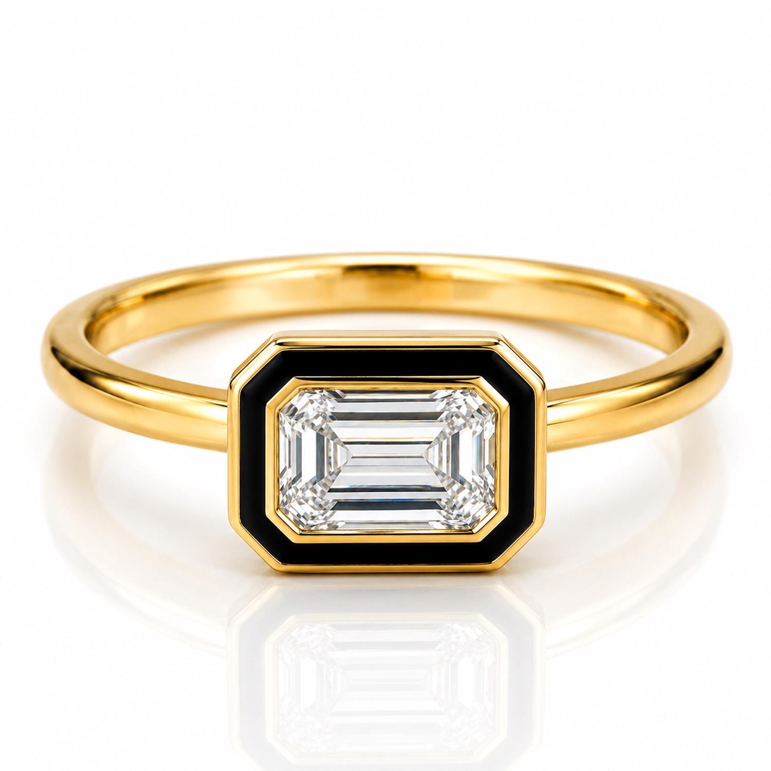 A gold ring with a large, clear gemstone set in the center.