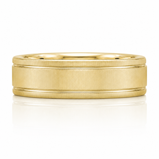 A gold ring with a simple, elegant design.