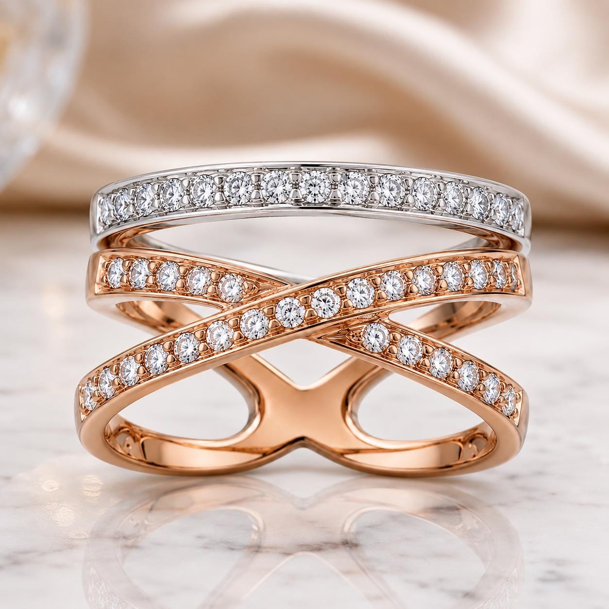 A close-up image of a ring with a combination of gold and silver bands, each adorned with a row of diamonds.