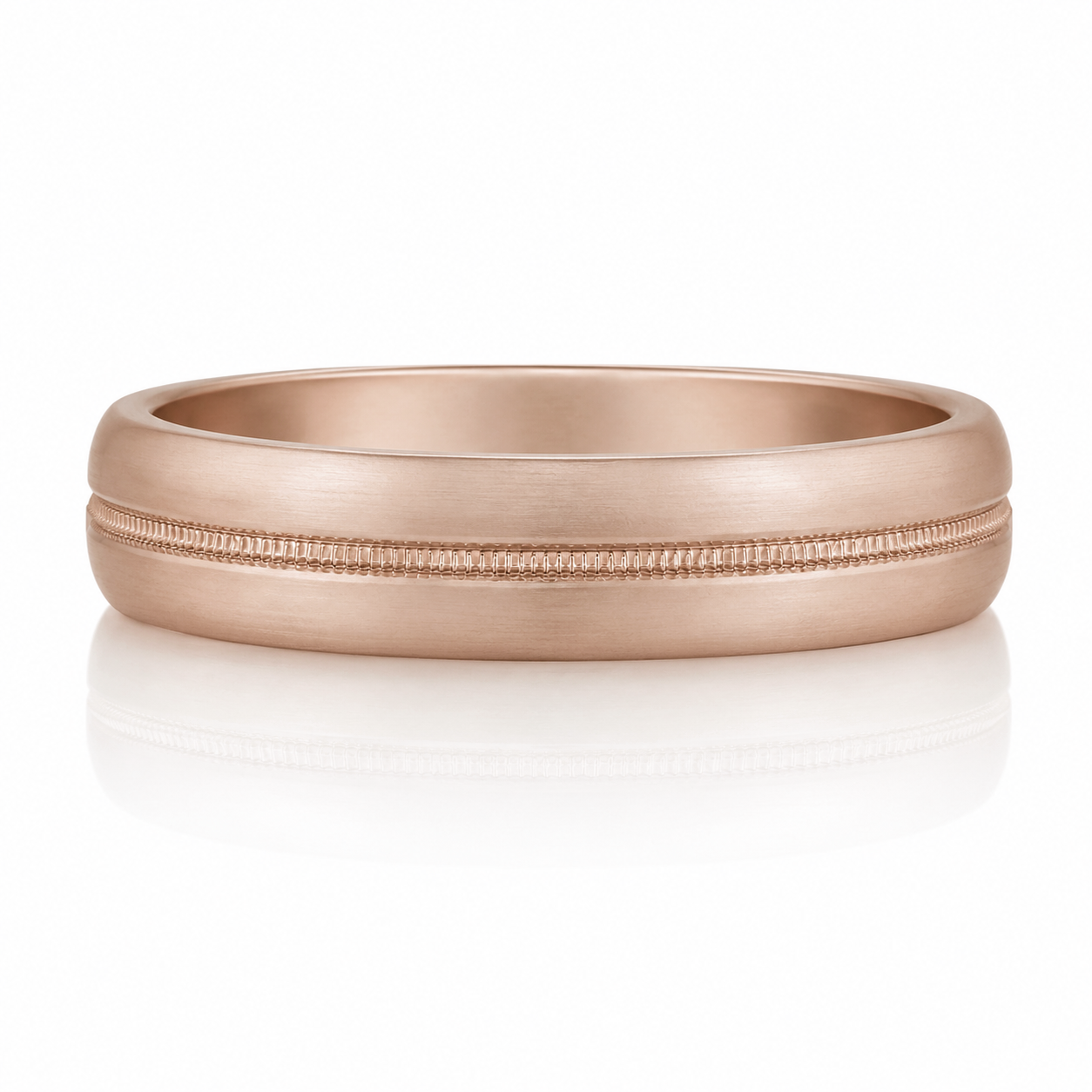 A gold-colored ring with a simple, elegant design.