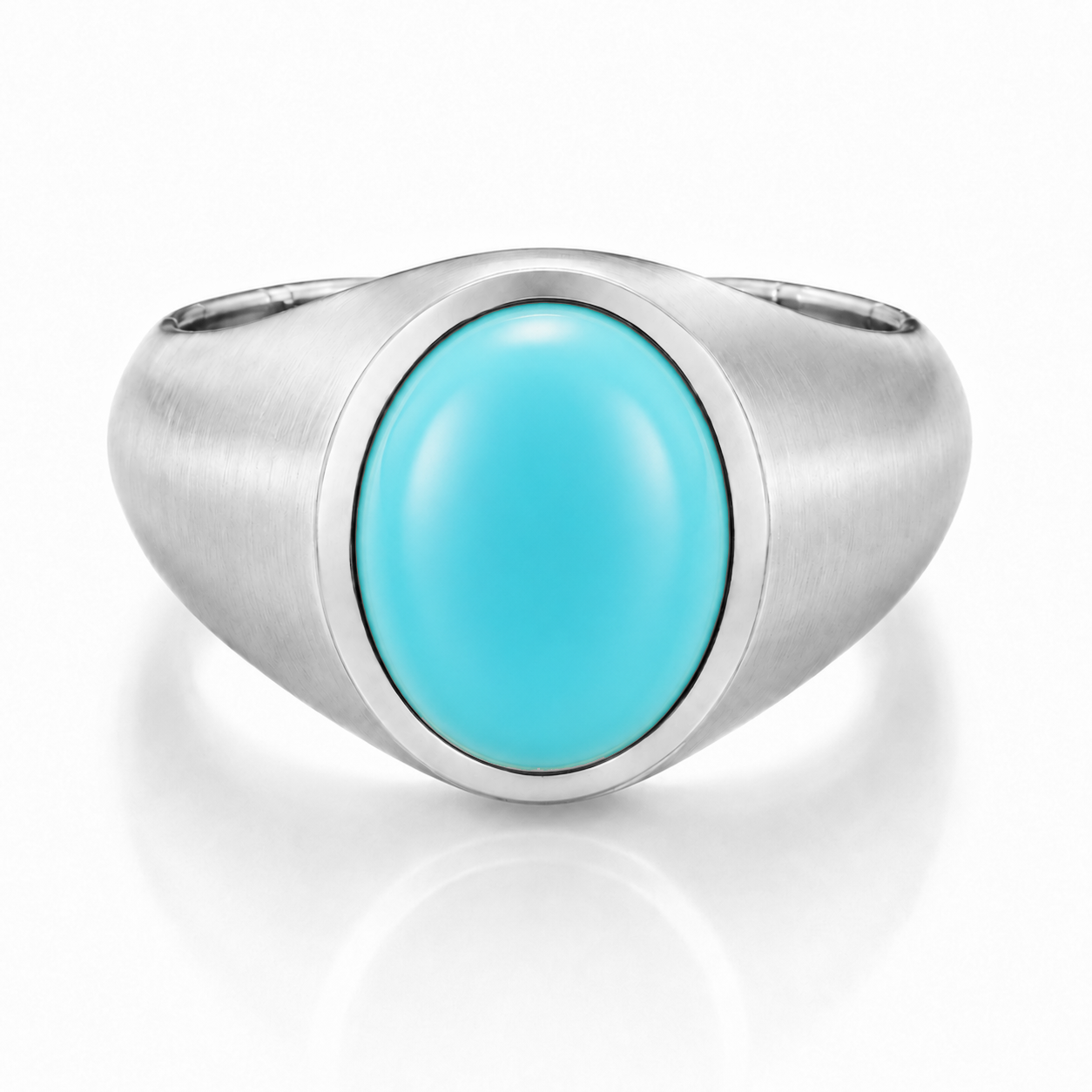 A silver ring with a turquoise stone in the center.