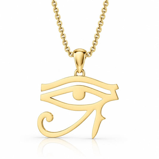 A gold-colored pendant necklace with a large eye symbol on it.
