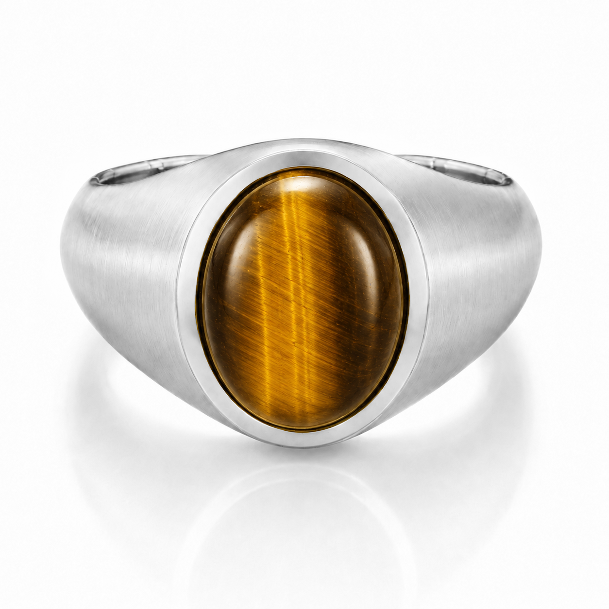 A silver ring with a large, round, amber-colored gemstone in the center.