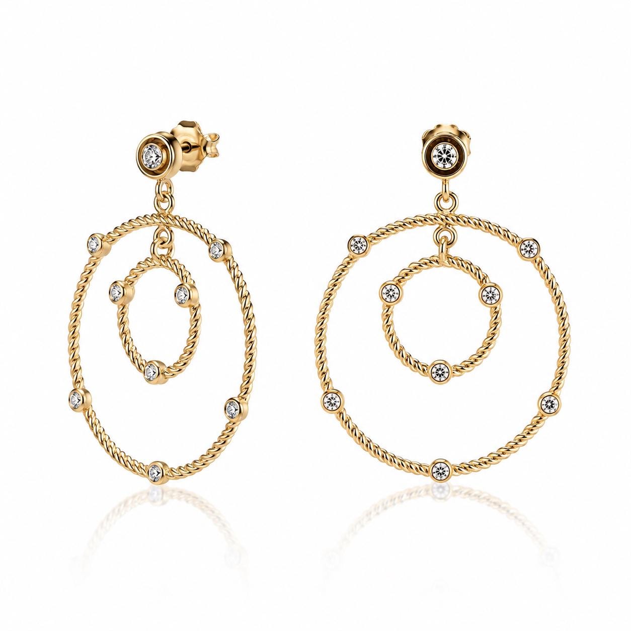 a pair of gold earrings with diamond-encrusted designs.
