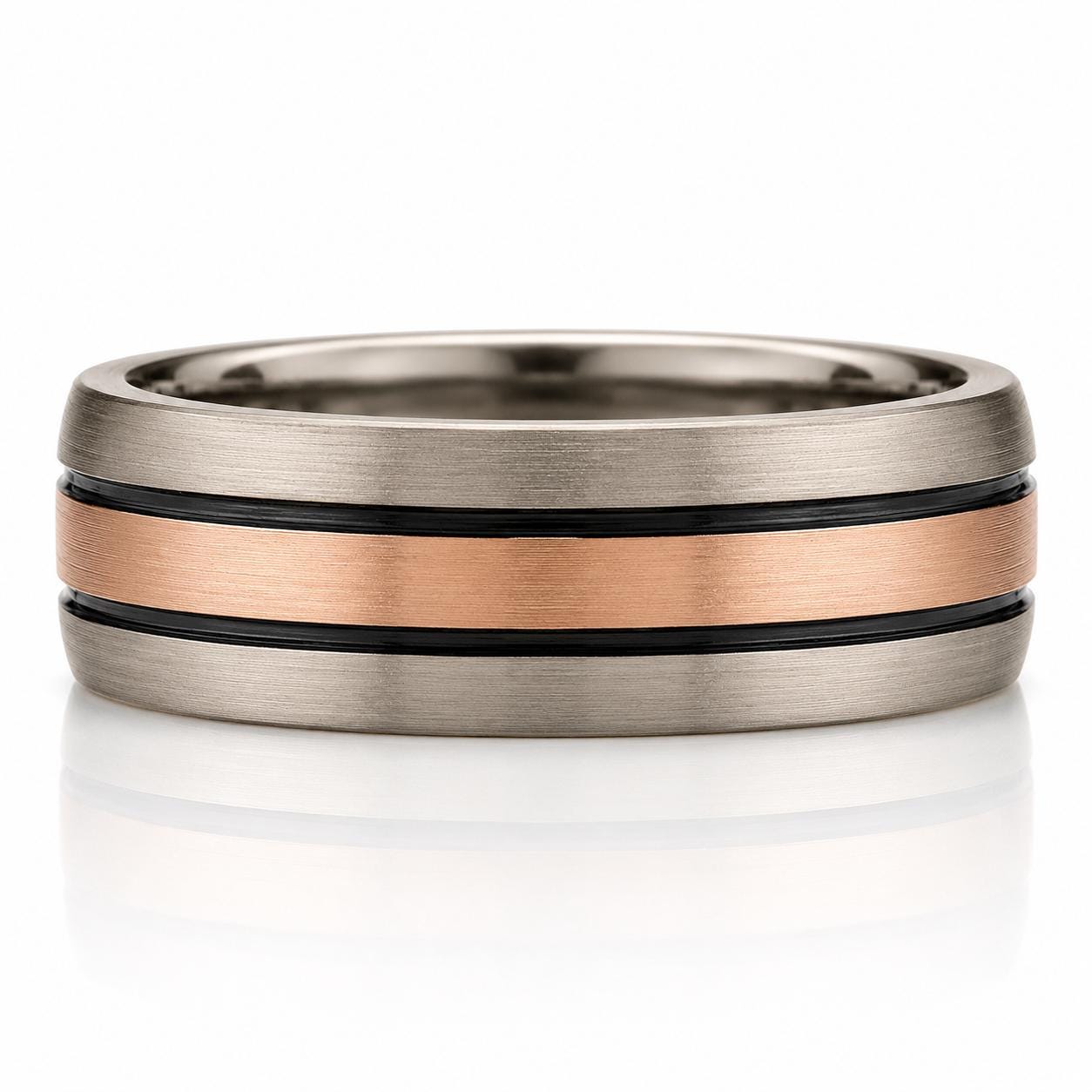 A silver and copper ring with a textured band design.