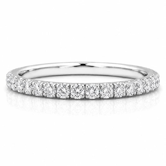 A silver band ring with a row of small diamonds set in it.