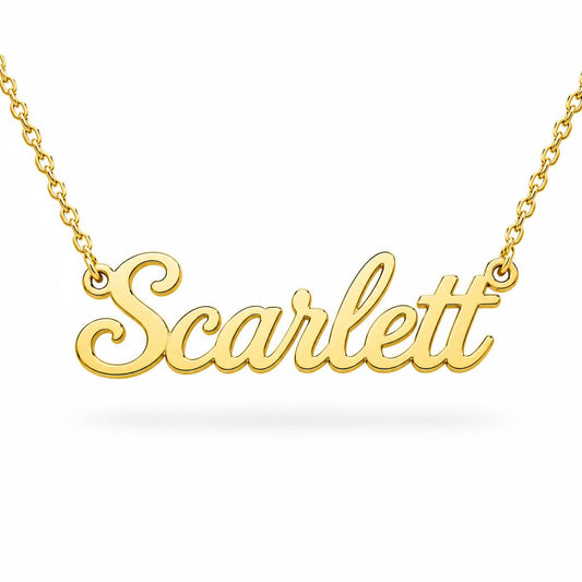 A gold-colored necklace with the name "Scarflet" engraved on it.