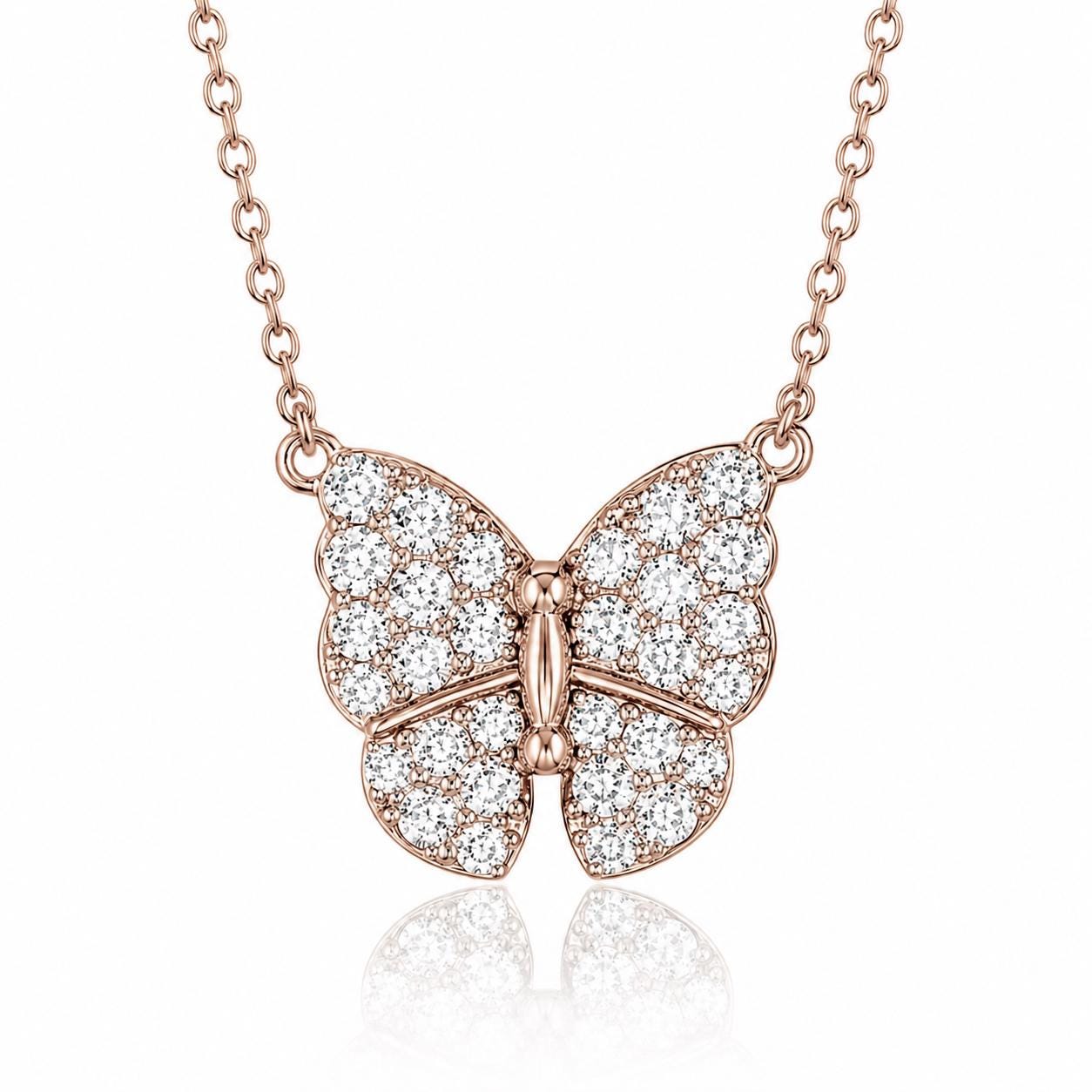 A delicate pink gold necklace with a pendant in the shape of a butterfly, adorned with numerous small diamonds.
