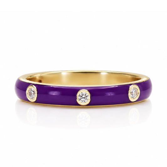 A ring with a purple band and three diamonds set in it.