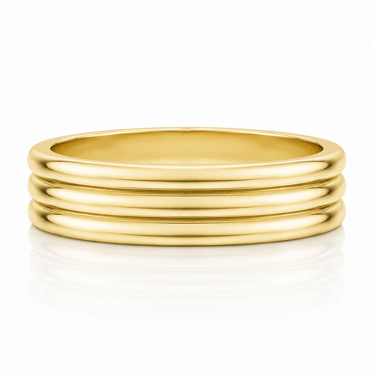 A gold ring with three concentric bands, showcasing its elegant design.