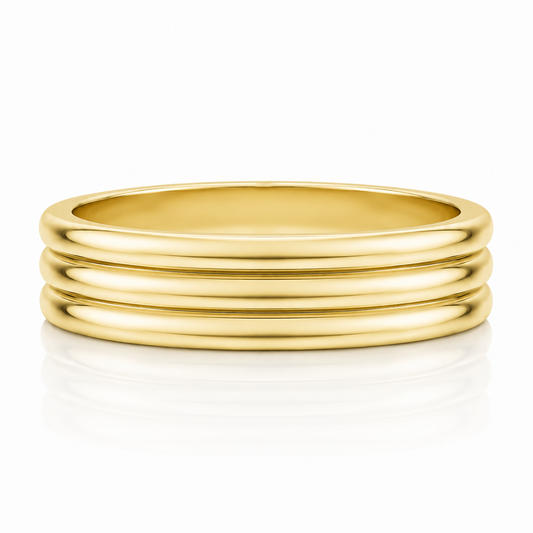 A gold ring with three concentric bands, showcasing its elegant design.