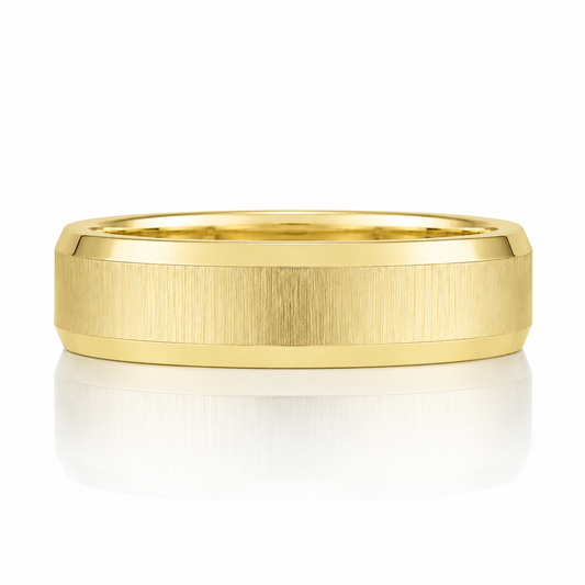 A gold ring with a textured band is shown against a white background.