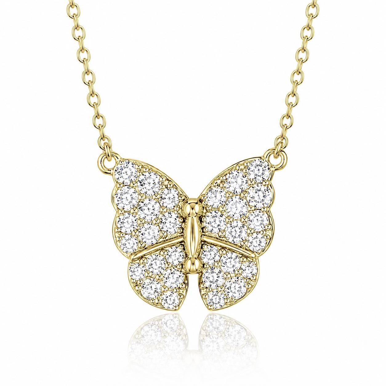 A delicate gold necklace with a large, intricately designed diamond-encrusted butterfly pendant.