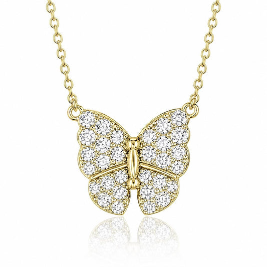 A delicate gold necklace with a large, intricately designed diamond-encrusted butterfly pendant.