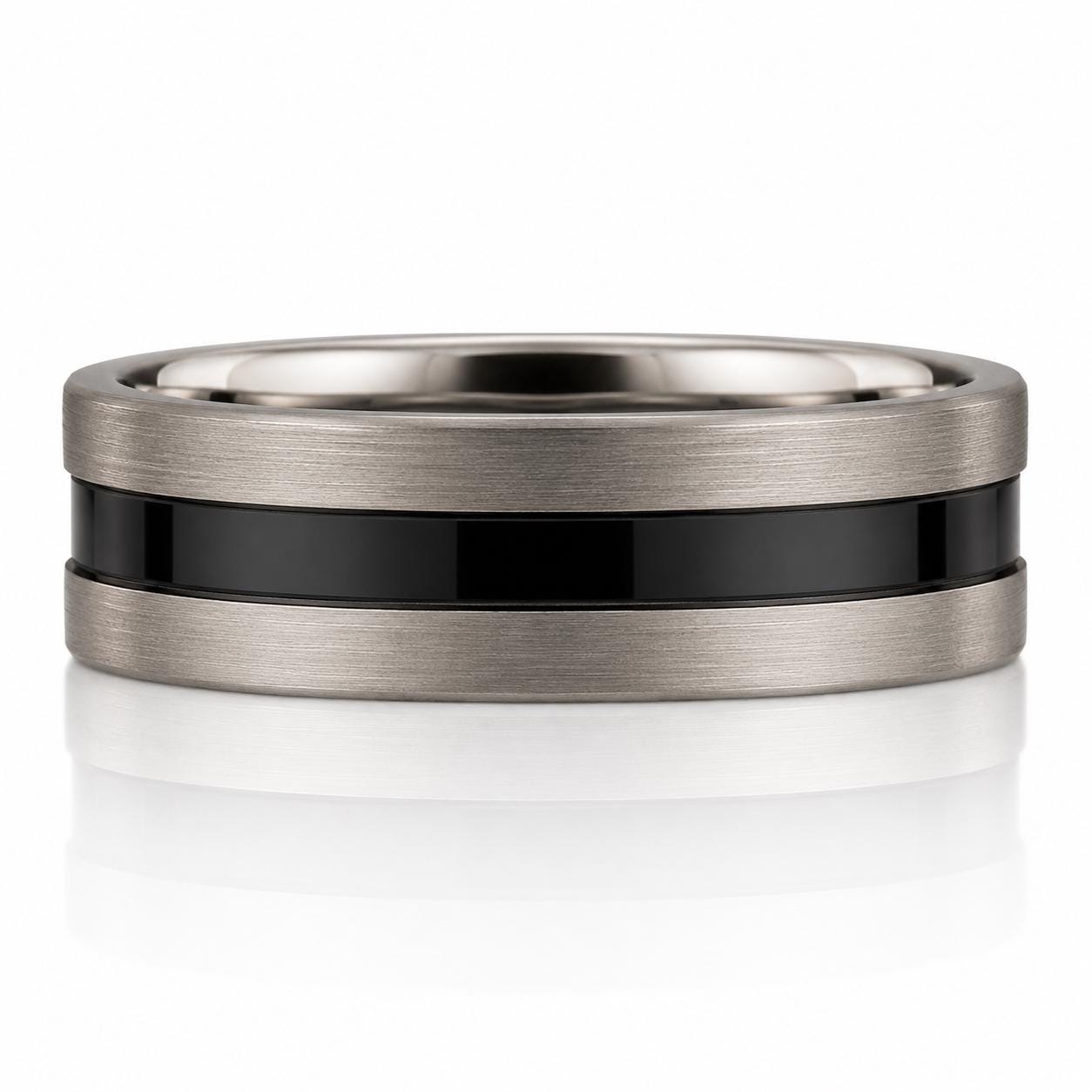 A silver ring with a black band in the center, set against a white background.