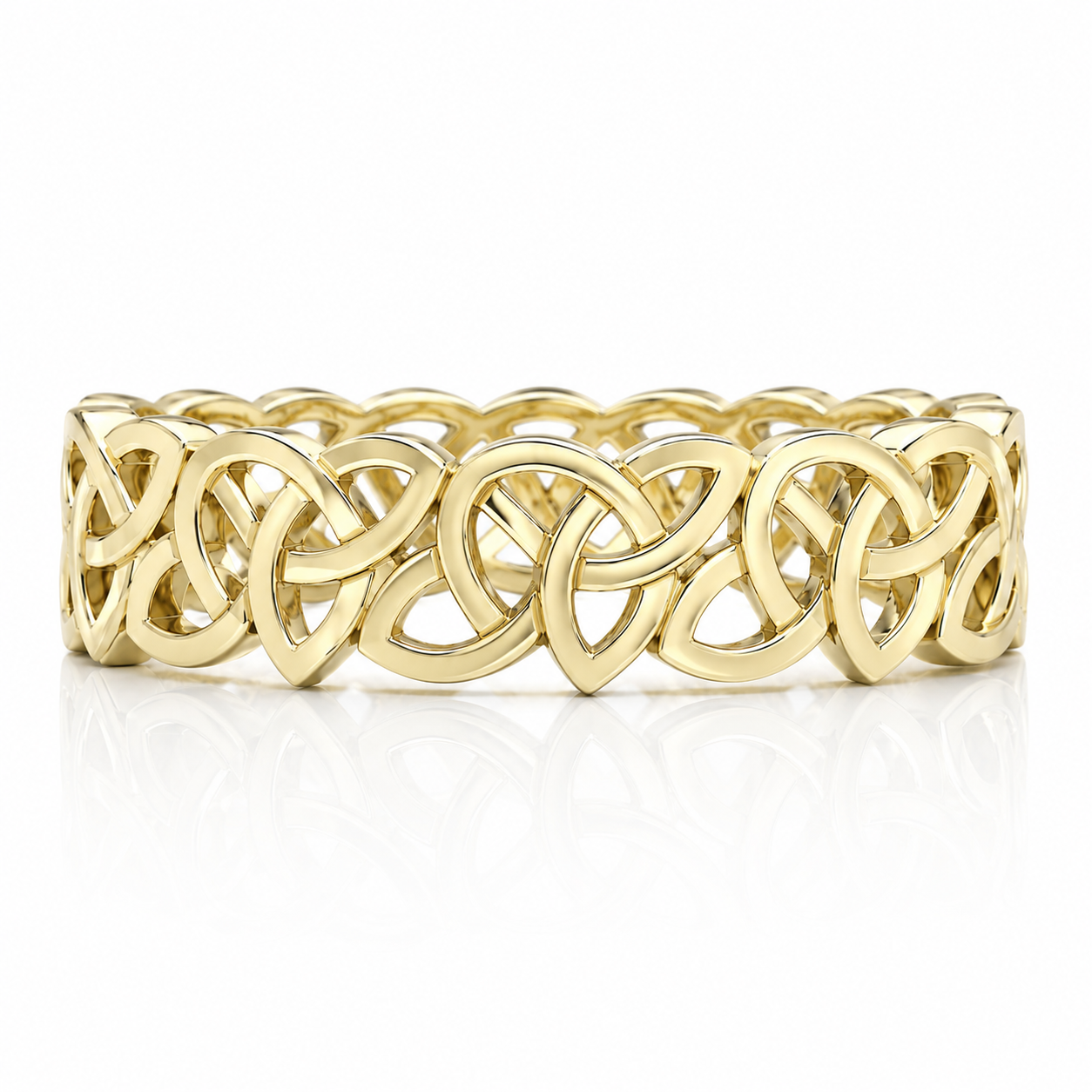 A gold bracelet with intricate Celtic knot designs.
