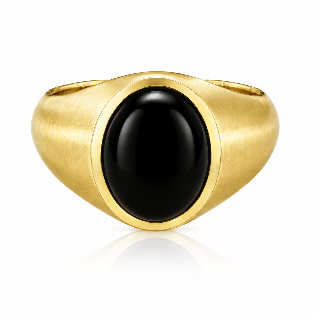 A gold ring with a black gemstone, likely a diamond, in the center.