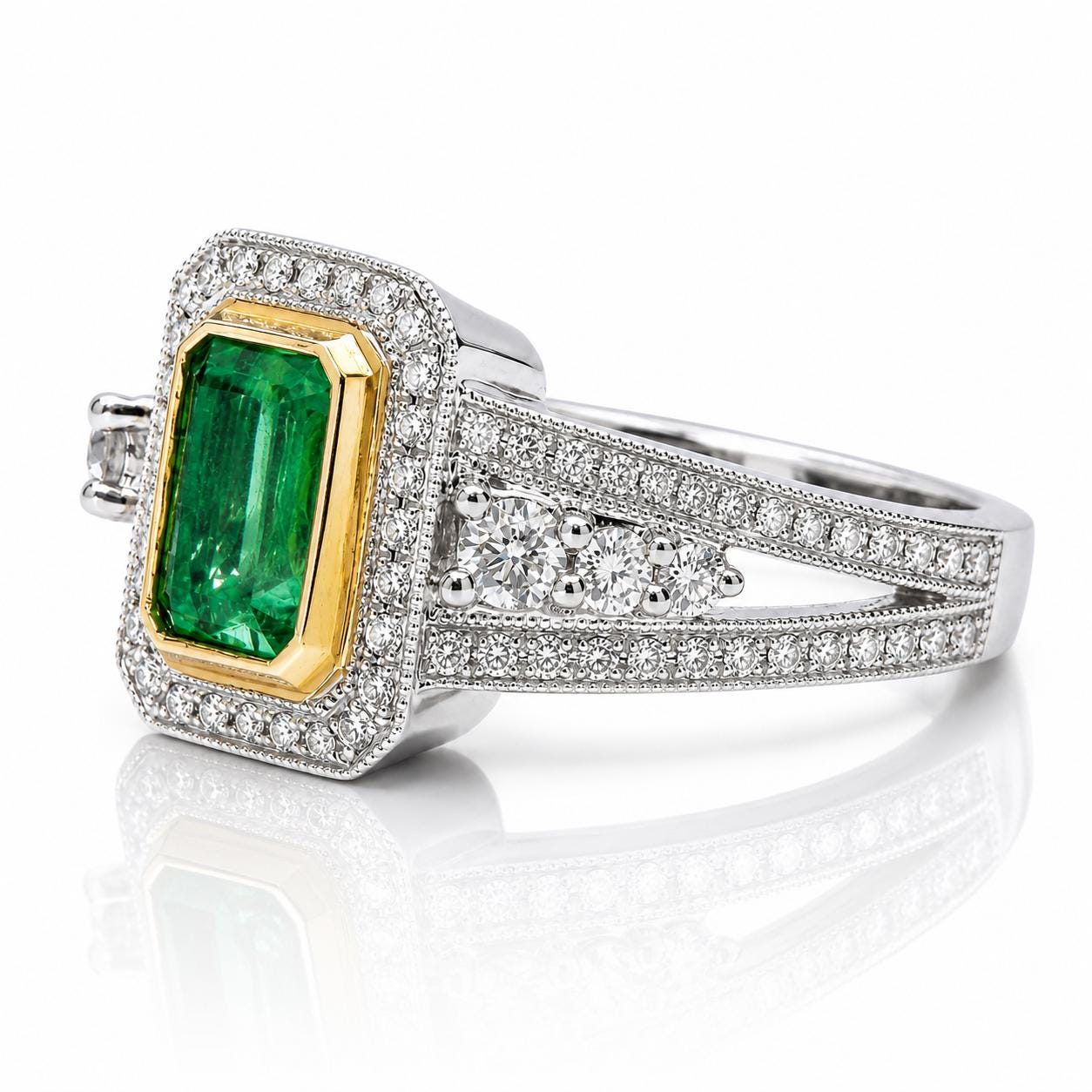 A diamond ring with a large, vibrant green gemstone set in a halo of smaller diamonds.