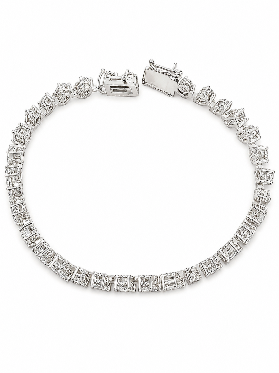 A silver bracelet with a row of small diamonds or gemstones arranged in a decorative pattern.