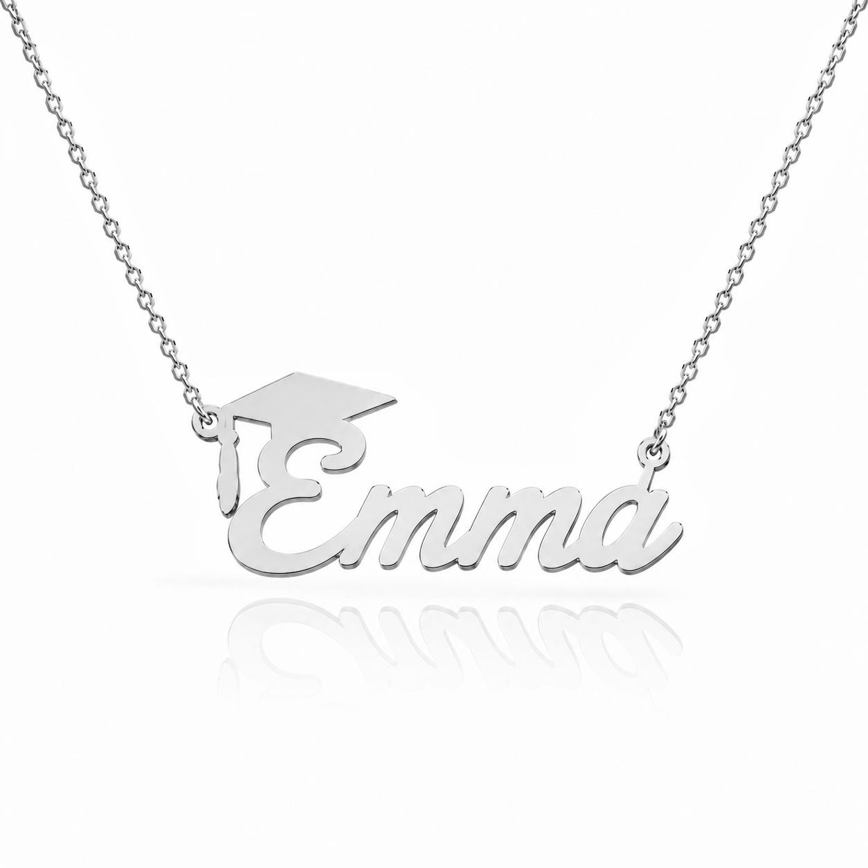 A silver necklace with the name "Emma" engraved on it.