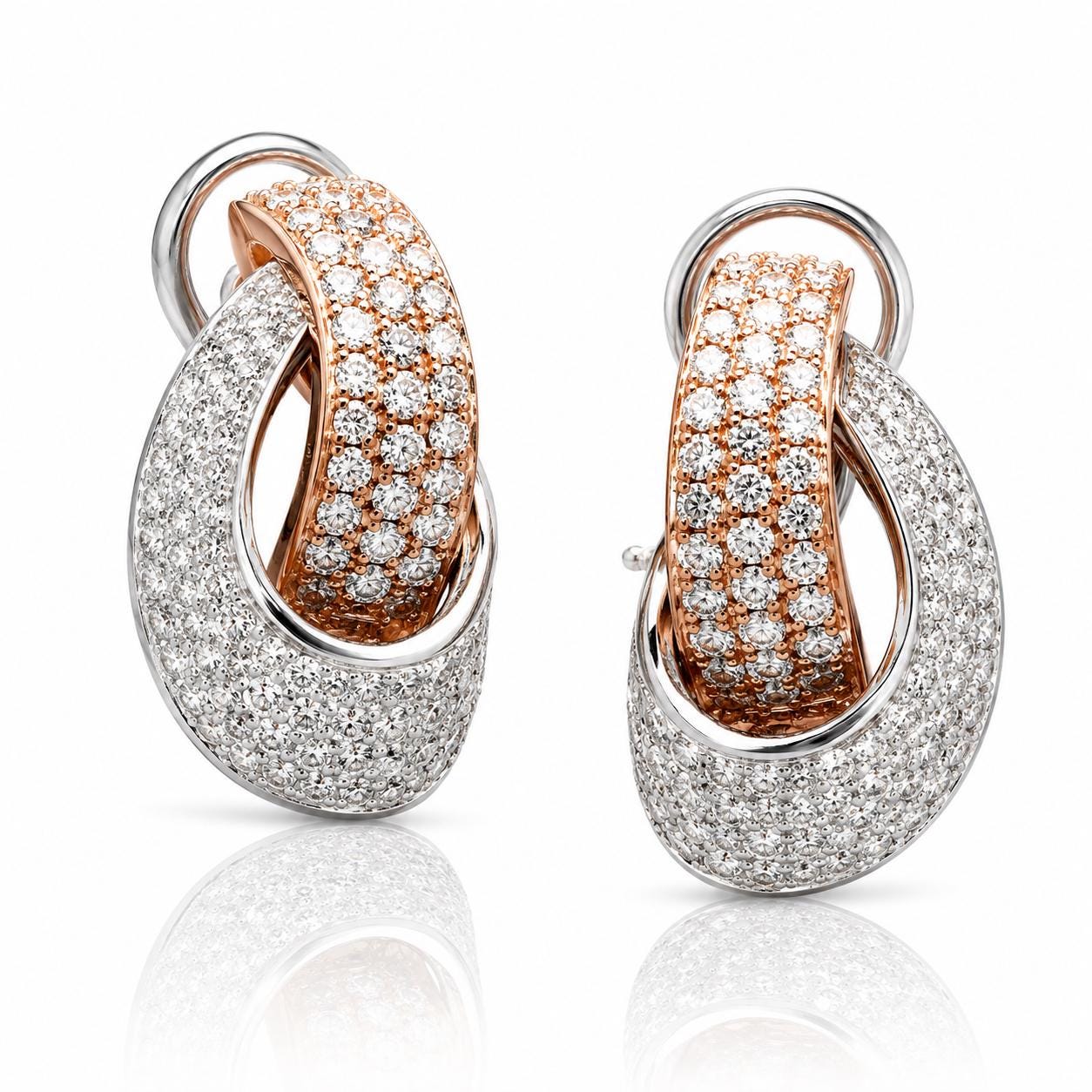 A pair of elegant earrings with a combination of gold and white diamonds set in a circular pattern.