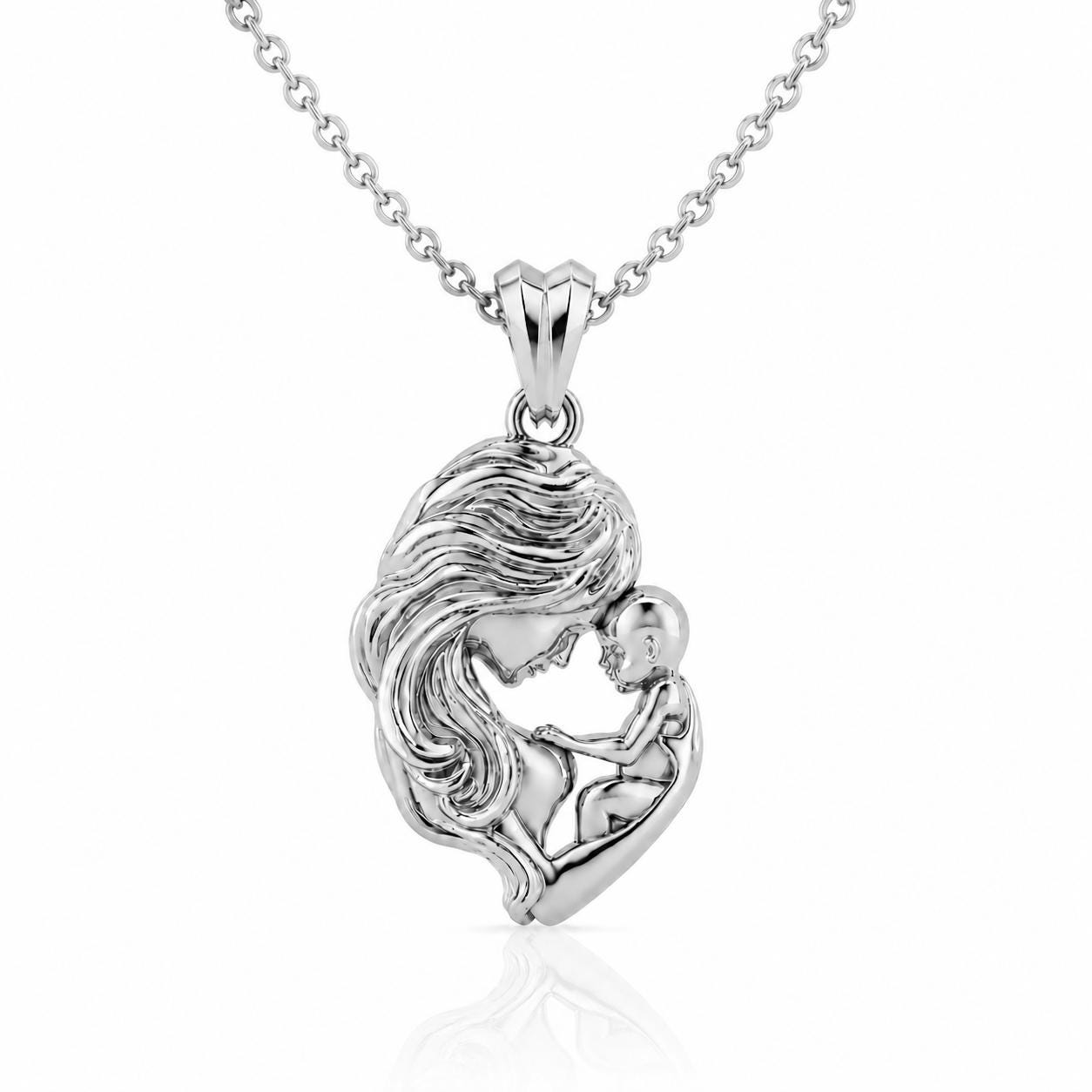 A silver-toned pendant necklace with a pendant featuring a mother and child design.
