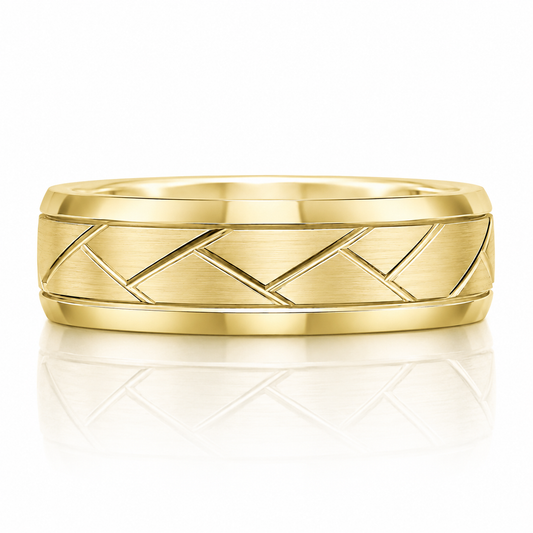 A gold ring with a geometric pattern design.