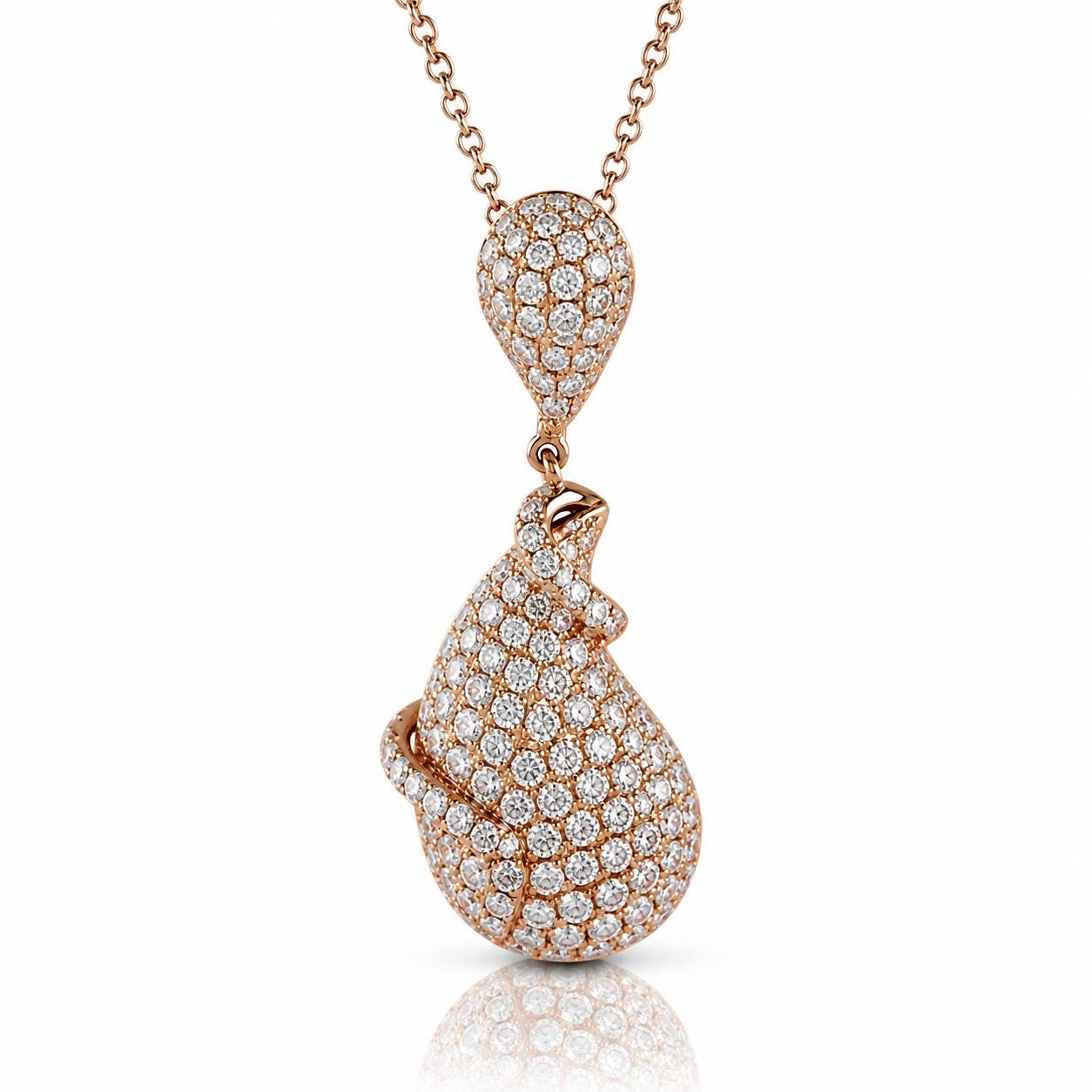 A necklace with a pendant featuring a large, intricately designed crystal or gemstone.