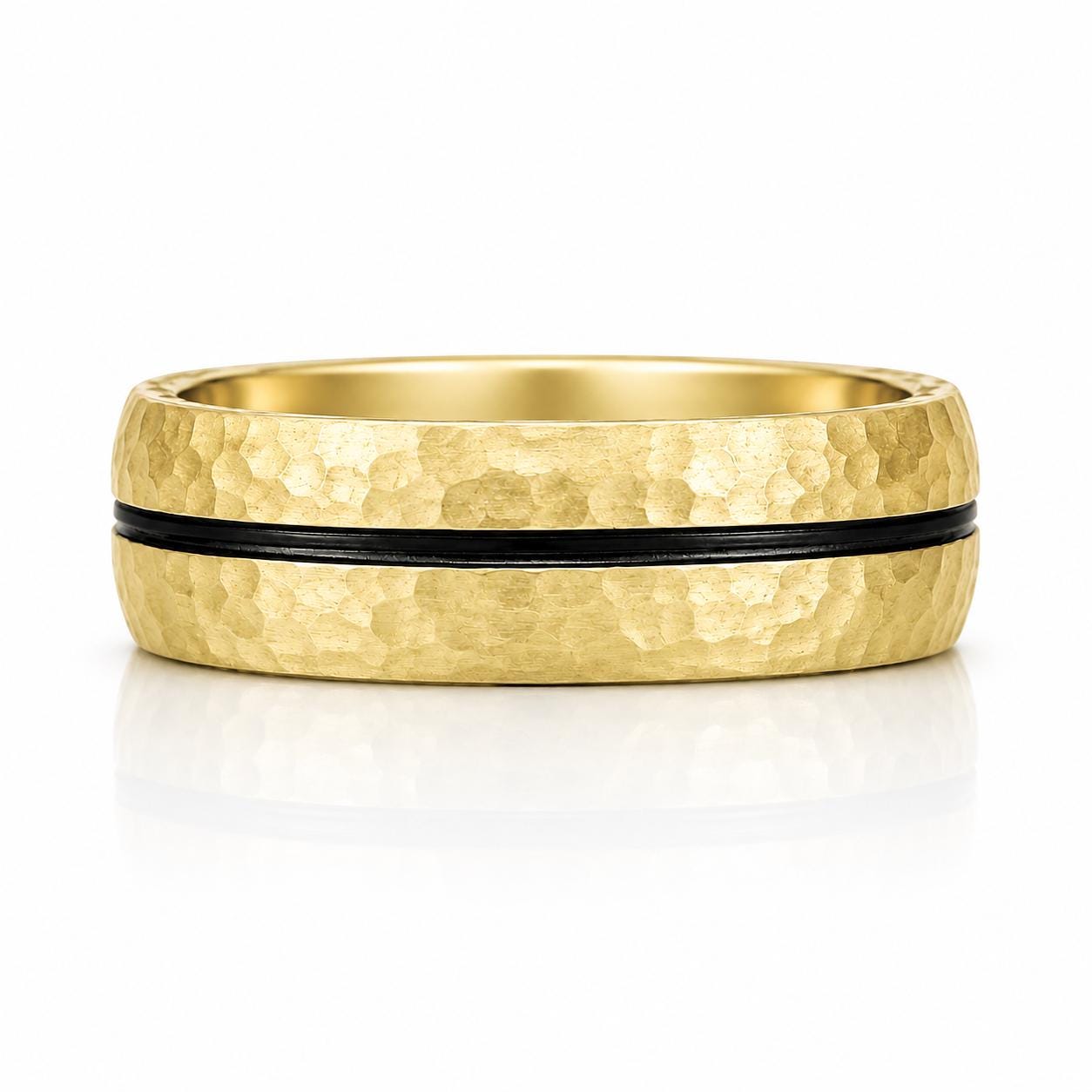 A gold ring with a black band, showcasing its textured and shiny appearance.